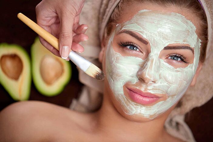 Applying a face mask to rejuvenate at home